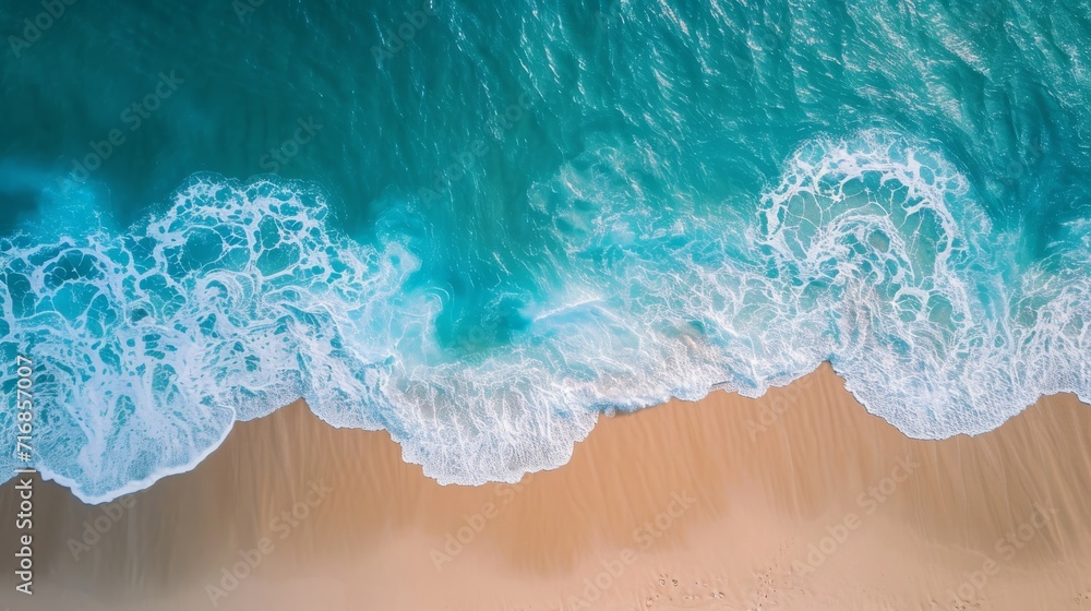 Wall mural top aerial view of a sandy beach with gentle waves background - Wall murals