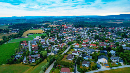Aerial of the village Strasskirchen in Bavaria on a cloudy afternoon in summer