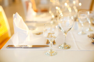 Glasses and plates on the tables