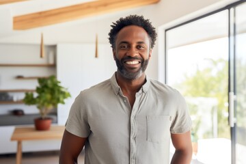 Portrait of a cheerful afro-american man in his 40s sporting a breathable hiking shirt against a crisp minimalistic living room. AI Generation