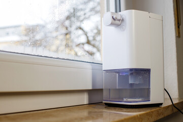 electric dehumidifier at home. mold in the house