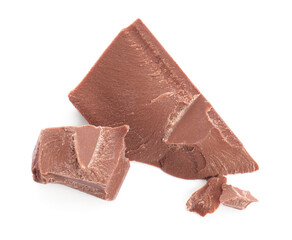 Pieces of tasty milk chocolate isolated on white, top view