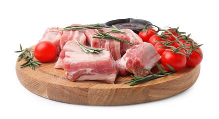 Cut raw pork ribs with rosemary, tomatoes and sauce isolated on white