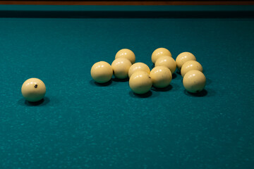 billiard balls on a table with green cloth, leisure activities, sports games