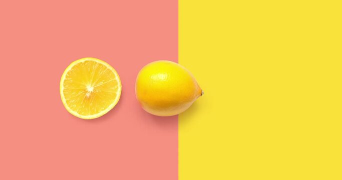 Creative animation made of lemon moving from left to right on the pink and yellow  background. Animation concept food. 
