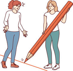 Woman draws boundary and prohibits crossing it, using large pencil to draw red line. Concept of...