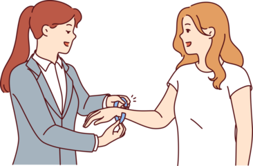 Woman administrator of nightclub puts bracelet on arm of female visitor came to closed party