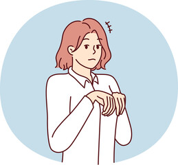 Young girl stands like puppy or bunny, bending palms near chest in pose symbolizing obedience and humility. Attractive woman in white shirt looks at screen in embarrassment