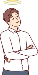 Kind man with angel halo above head is thinking about charitable assistance to people and wants to become volunteer. Kind guy, owner of non-profit company, stands with arms crossed and dreams future.