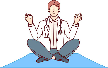 Meditating male doctor sitting in lotus position and taking break to practice stress-relieving yoga. Clinic employee with stethoscope around neck enjoys yoga to increase work productivity.