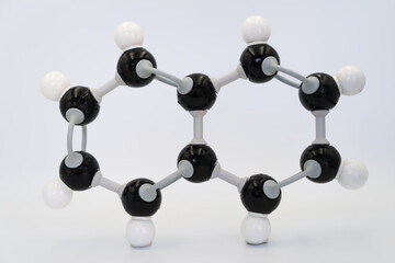 Naphthalene (or naphthalin) molecule made by molecular model on white background. Chemical formula...