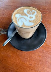 Coffee Art, a cappuccino with a rabbit or bunny drawing in the foam