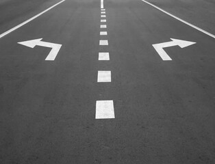 Two arrows on the road