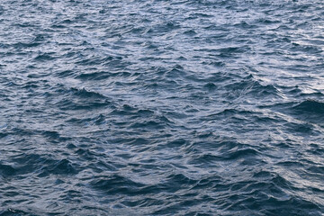 Bright blue sea surface, close-up.