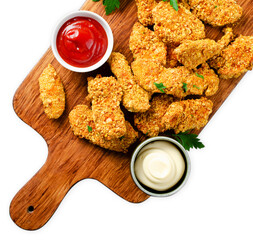 Delicious Crispy Fried Breaded Chicken Breast Strips with Ketchup on White Background