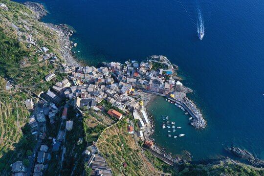 Aerial view of Riomaggiore: Riomaggiore in the province of La Spezia, Liguria. An ancient fishing village on the Riviera di Levante, it forms the easternmost and southernmost part of the Cinque Terre 