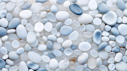Fototapeta na wymiar white and blue pebbles as background, closeup of photo