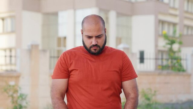 Bald indian Man feeling Guilty