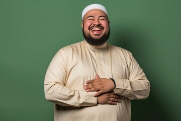 a muslim man poses greetings on green background with generative ai