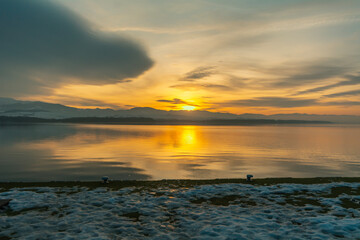 Fototapeta premium Sunset over the Liptovska Mara reservoir, Slovakia.