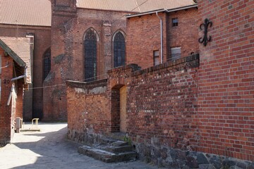 Fototapeta premium A street leading to the medieval cathedral in Chelmza, Poland.