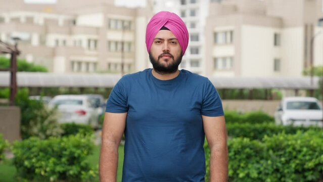 Seriouse Indian Man Looking at Camera