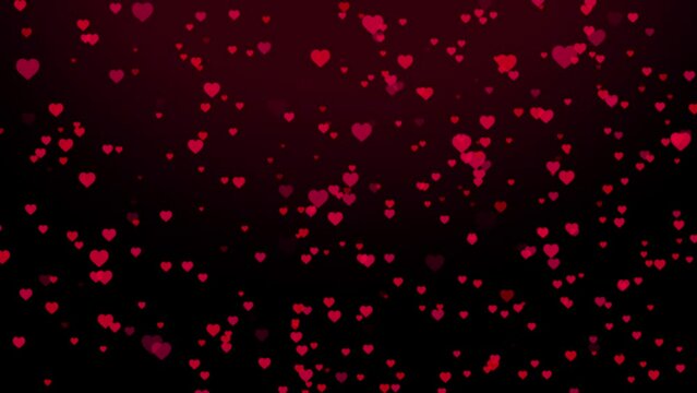 Like hearts fly from top to bottom on a black background 4k video