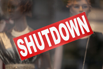 Shutdown banner in a window shop