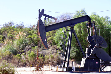 The Inglewood Oil Field pumpjack located in the Baldwin Hills, Los Angeles, California - 717031821