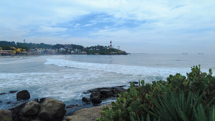 Kovalam beach and vizhinjam light house, Arabian sea, Thiruvananthapuram, Kerala seascape view 