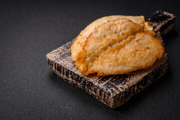 Delicious battered chicken breast chops with salt, spices and herbs