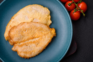 Delicious battered chicken breast chops with salt, spices and herbs