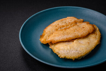 Delicious battered chicken breast chops with salt, spices and herbs