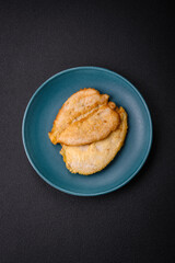 Delicious battered chicken breast chops with salt, spices and herbs