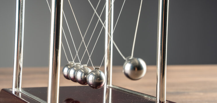 Harmony in Motion: Newton's Cradle Demonstrates the Beauty of Physics