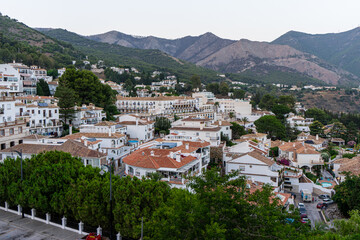 Fototapeta premium Panoramic night view of white houses in Mijas, Spain