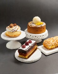 Several cakes desserts. Pastry background. Delicious cakes and pies advertisement. Delicious pastry products