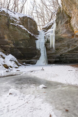 Frozen waterfall in Ottawa canyon on a brisk winter morning.  Starved Rock state park, Illinois, USA