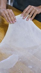 Preparing Traditional Yemeni Jachnun with Butter &ndash; Authentic Dough Crafting and Stretching