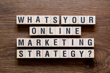 Whats your online marketing strategy - word concept on building blocks, text