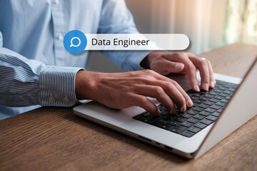 A person looking for the term Data Engineer. IT Concept. Data Analysis. Digital World.