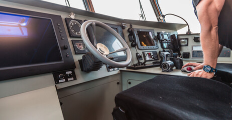 Navigational Bridge of a Modern Military Vessel Featuring Advanced Communication Equipment and Ship Controls © True Pixel Art