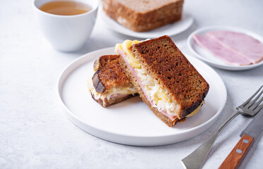 Reuben sandwich with ham, sauerkraut and cheese