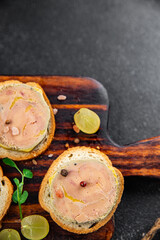 foie gras liver sandwich fresh goose or duck appetizer meal food snack on the table copy space food background rustic top view © Alesia Berlezova