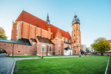 Fotobehang Corpus Christi Basilica famous landmark in Krakow Poland. Landscape on coast river Wisla © alexanderuhrin