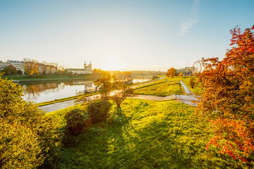 Wawel castle famous landmark in Krakow Poland. Landscape on coast river Wis - obrazy, fototapety, plakaty