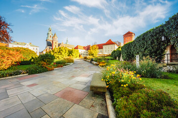 Wawel castle famous landmark in Krakow Poland. Landscape on coast river Wis - obrazy, fototapety, plakaty