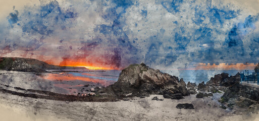 Digital watercolour painting of Beautiful sunrise landscape image of Kennack Sands in Cornwall UK wuth dramatic moody clouds and vibrant sunburst