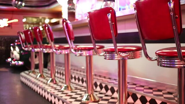 Close up view of seats near bar counter in restaurant