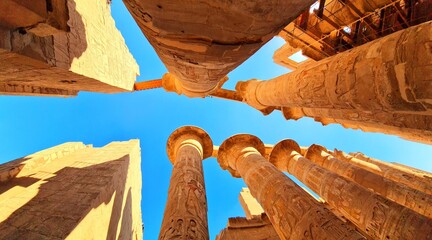 Hypostyle Hall with huge columns in Karnak temple in Luxor, Egypt. - obrazy, fototapety, plakaty